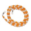 A chain for glasses, beads, an orange pendant A chain for glasses, beads, an orange pendant
